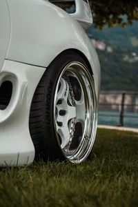 Preview wallpaper car, white, wheel, disk, closeup