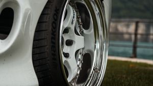 Preview wallpaper car, white, wheel, disk, closeup