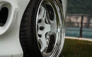 Preview wallpaper car, white, wheel, disk, closeup
