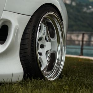 Preview wallpaper car, white, wheel, disk, closeup