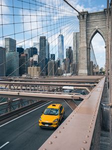 Preview wallpaper car, yellow, bridge, city, buildings