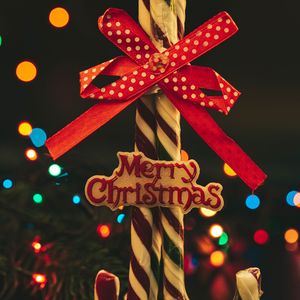 Preview wallpaper caramel sticks, candy, bow, christmas