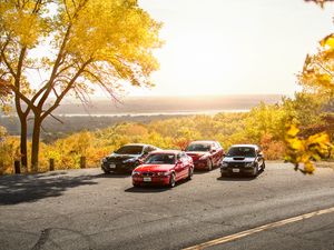 Preview wallpaper cars, asphalt, trees, parking