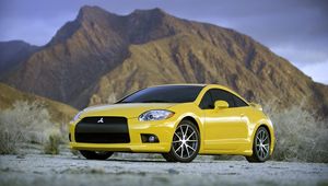 Preview wallpaper cars, mitsubishi, yellow, front view