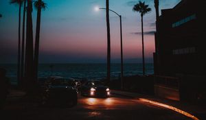 Preview wallpaper cars, palm trees, sunset, night, tropics