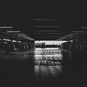 Preview wallpaper cars, parking, dark, black and white