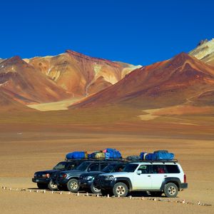 Preview wallpaper cars, parking, desert, mountains, camping
