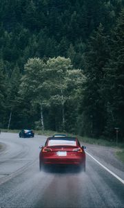 Preview wallpaper cars, pursuit, road, forest