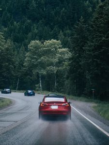 Preview wallpaper cars, pursuit, road, forest