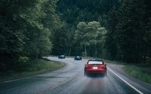 Preview wallpaper cars, pursuit, road, forest