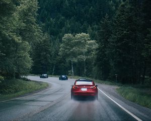 Preview wallpaper cars, pursuit, road, forest