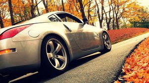 Preview wallpaper cars, road, autumn