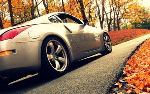 Preview wallpaper cars, road, autumn