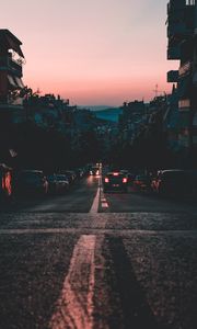 Preview wallpaper cars, road, dusk, city