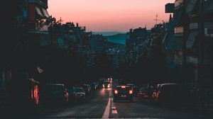 Preview wallpaper cars, road, dusk, city