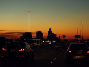 Preview wallpaper cars, road, lights, twilight, dark