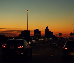 Preview wallpaper cars, road, lights, twilight, dark