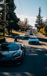 Preview wallpaper cars, road, speed, trees