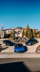 Preview wallpaper cars, sports cars, road, building