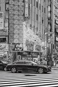 Preview wallpaper cars, street, city, buildings, bw