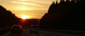 Preview wallpaper cars, track, sunset, road, traffic