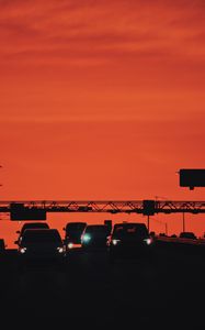 Preview wallpaper cars, transportation, sunset, headlights