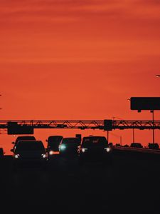 Preview wallpaper cars, transportation, sunset, headlights