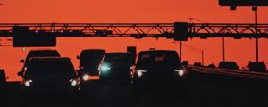 Preview wallpaper cars, transportation, sunset, headlights