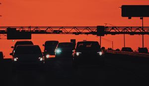 Preview wallpaper cars, transportation, sunset, headlights