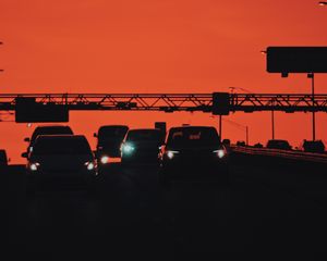 Preview wallpaper cars, transportation, sunset, headlights