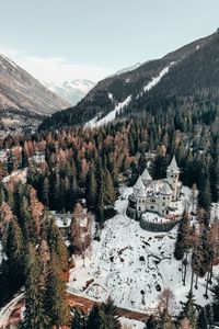 Preview wallpaper castle, aerial view, winter, snow, trees, forest, italy