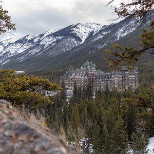 Preview wallpaper castle, architecture, building, mountains, slope