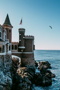 Preview wallpaper castle, building, architecture, cliffs, sea