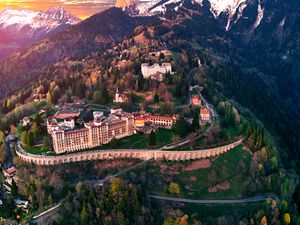 Preview wallpaper castle, building, architecture, mountains, snowy