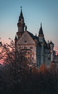 Preview wallpaper castle, building, architecture, trees, dusk