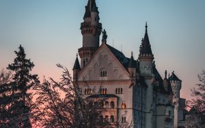 Preview wallpaper castle, building, architecture, trees, dusk