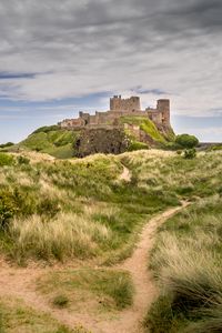 Preview wallpaper castle, building, grass, path, sky