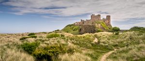 Preview wallpaper castle, building, grass, path, sky