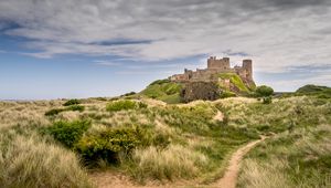 Preview wallpaper castle, building, grass, path, sky