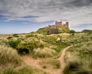 Preview wallpaper castle, building, grass, path, sky