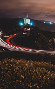 Preview wallpaper castle, building, hills, long exposure, light, night