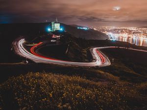 Preview wallpaper castle, building, hills, long exposure, light, night