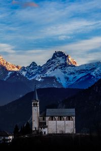 Preview wallpaper castle, building, tower, mountains, snow, snowy