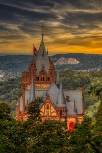Preview wallpaper castle, building, trees, sunset