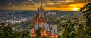 Preview wallpaper castle, building, trees, sunset