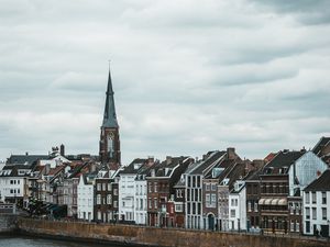Preview wallpaper castle, city, buildings, tower, river