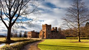 Preview wallpaper castle, city, country, grass, sky