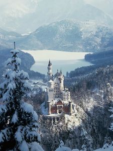 Preview wallpaper castle, city, sky, forest, winter, snow