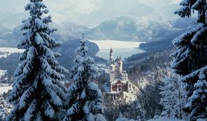Preview wallpaper castle, city, sky, forest, winter, snow