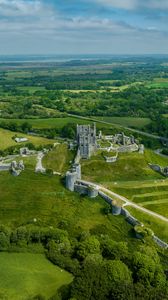 Preview wallpaper castle, fence, ruins, fields, trees, landscape, aerial  view